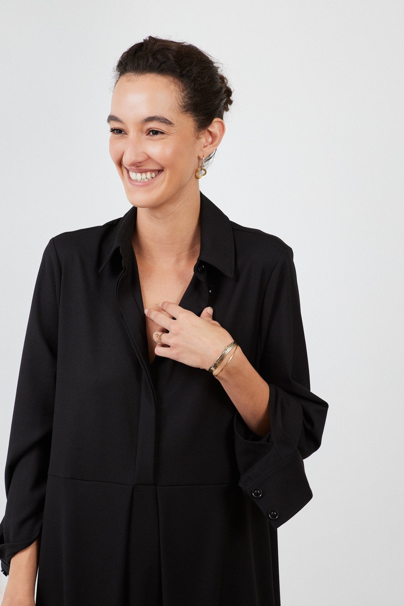 Model wearing midi shirt dress with elegant drape and modern fit | Black - Maison Marron et amis