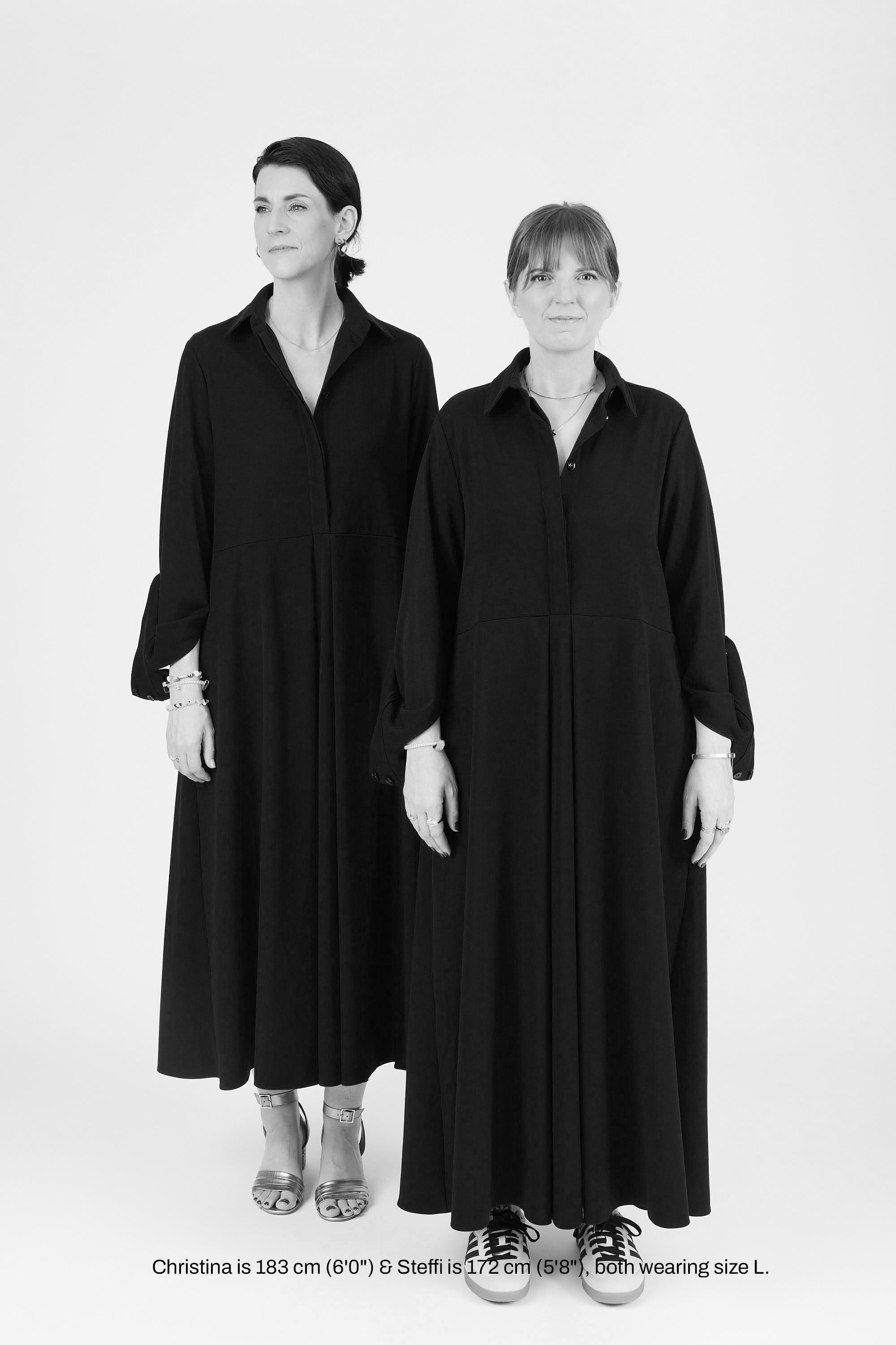 Models wearing midi shirt dress with elegant drape and modern fit | Black - Maison Marron et amis