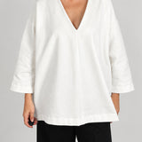 Cocoon Sweatshirt in off-white, front view with the deep V-neck - Maison Marron et amis