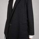 Open Side Blazer in black, side detail with the straps hanging loose - Maison Marron et amis