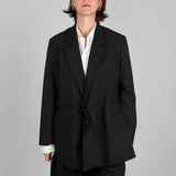 Open Side Blazer in black with the straps tied at the waist - Maison Marron et amis