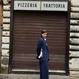 Open Side Blazer in navy, side view in front of a shutter - Maison Marron et amis