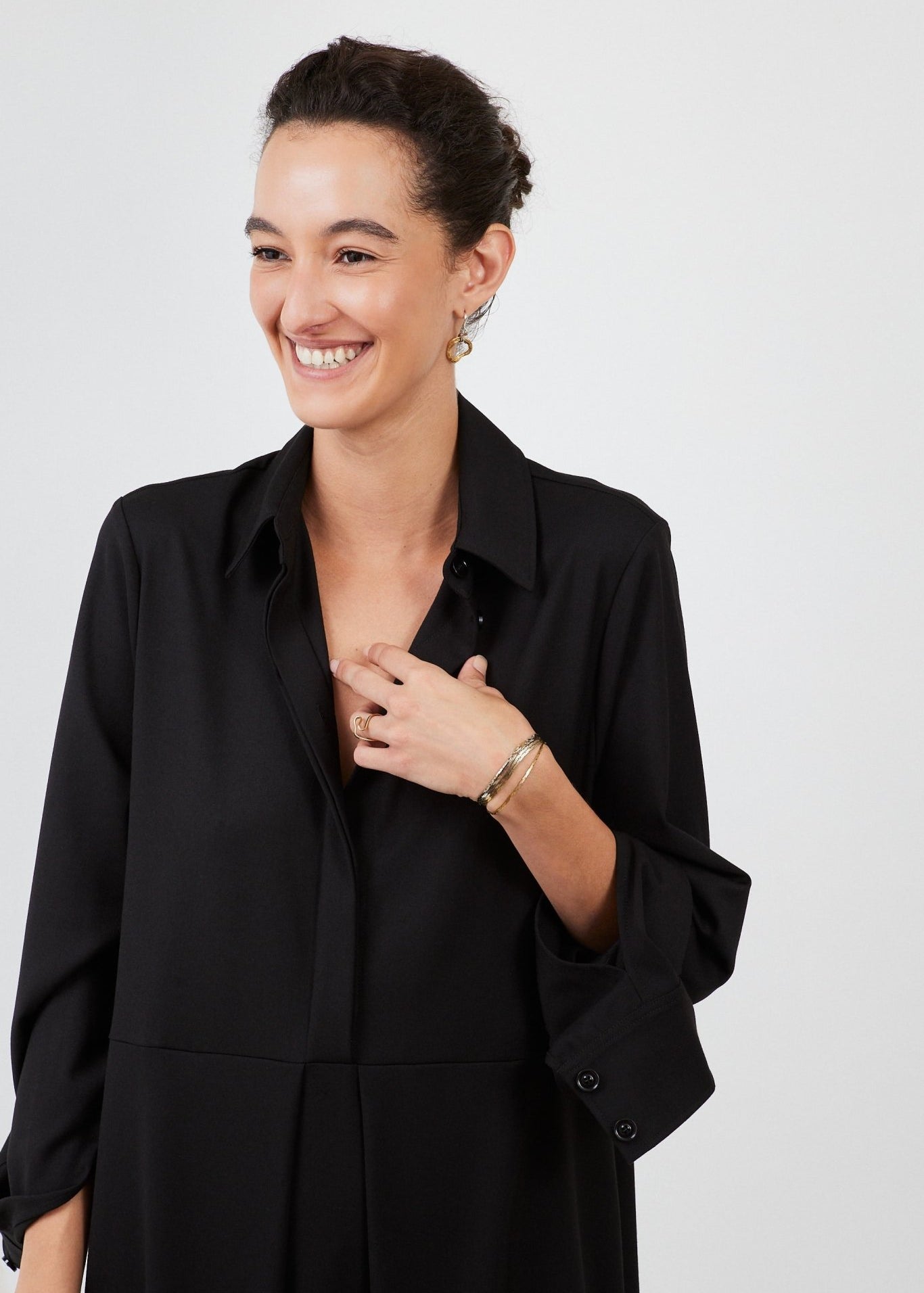 Model wearing midi shirt dress with elegant drape and modern fit | Black - Maison Marron et amis