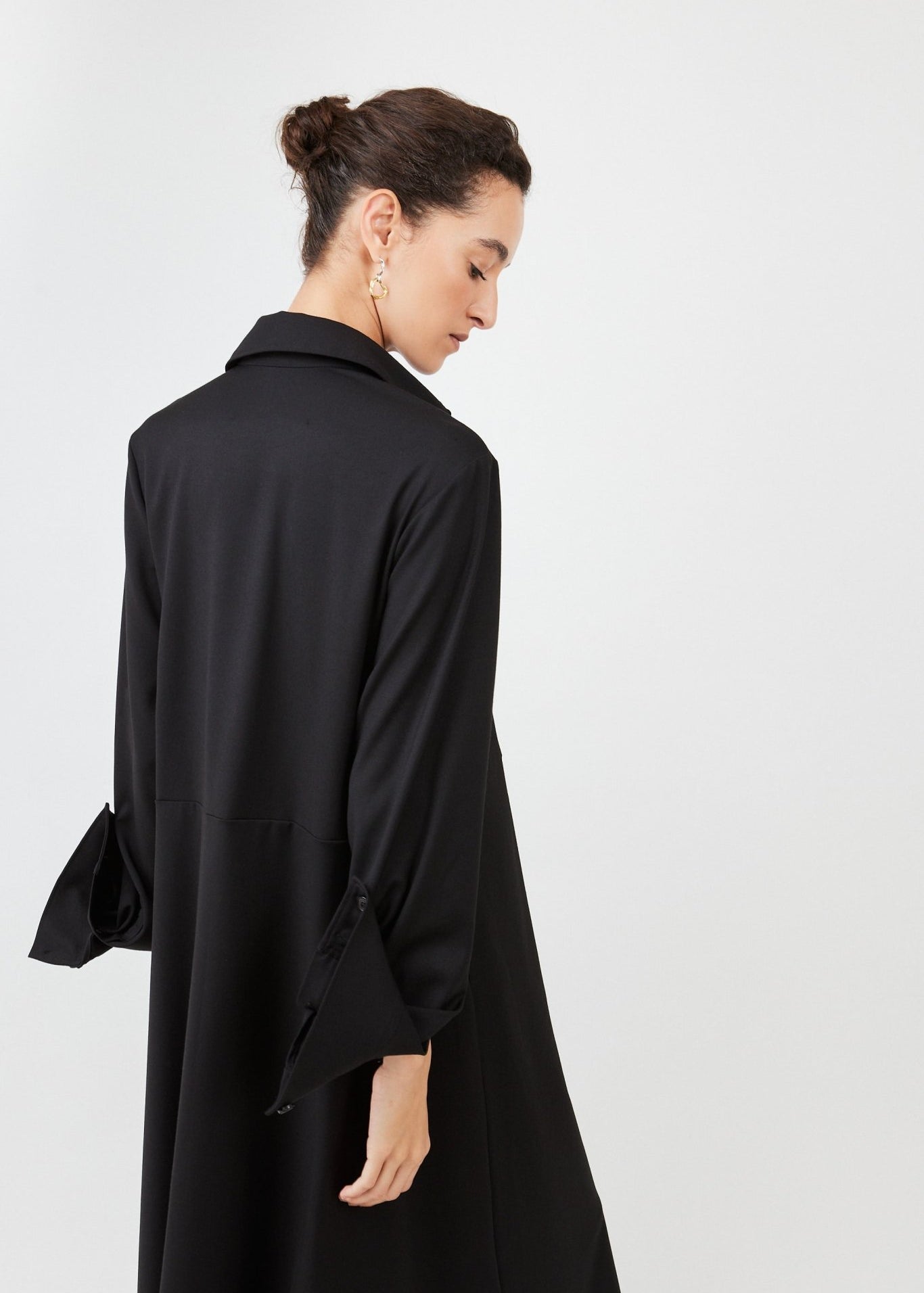 Model wearing midi shirt dress with elegant drape and modern fit | Black - Maison Marron et amis
