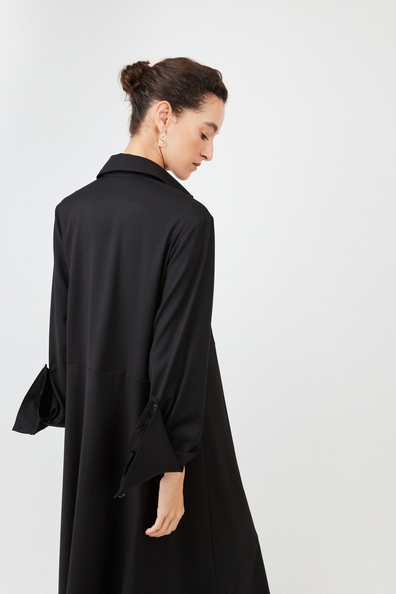 Model wearing midi shirt dress with elegant drape and modern fit | Black - Maison Marron et amis