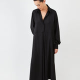 Model wearing midi shirt dress with elegant drape and modern fit | Black - Maison Marron et amis
