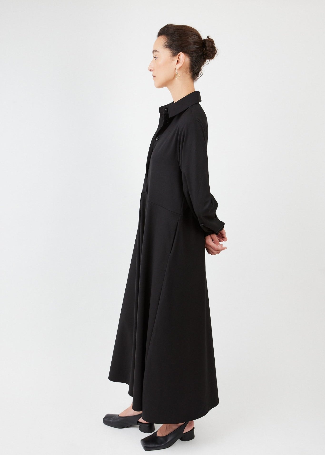 Model wearing midi shirt dress with elegant drape and modern fit | Black - Maison Marron et amis