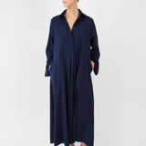 Model wearing midi shirt dress with elegant drape and modern fit| Navy - Maison Marron et amis