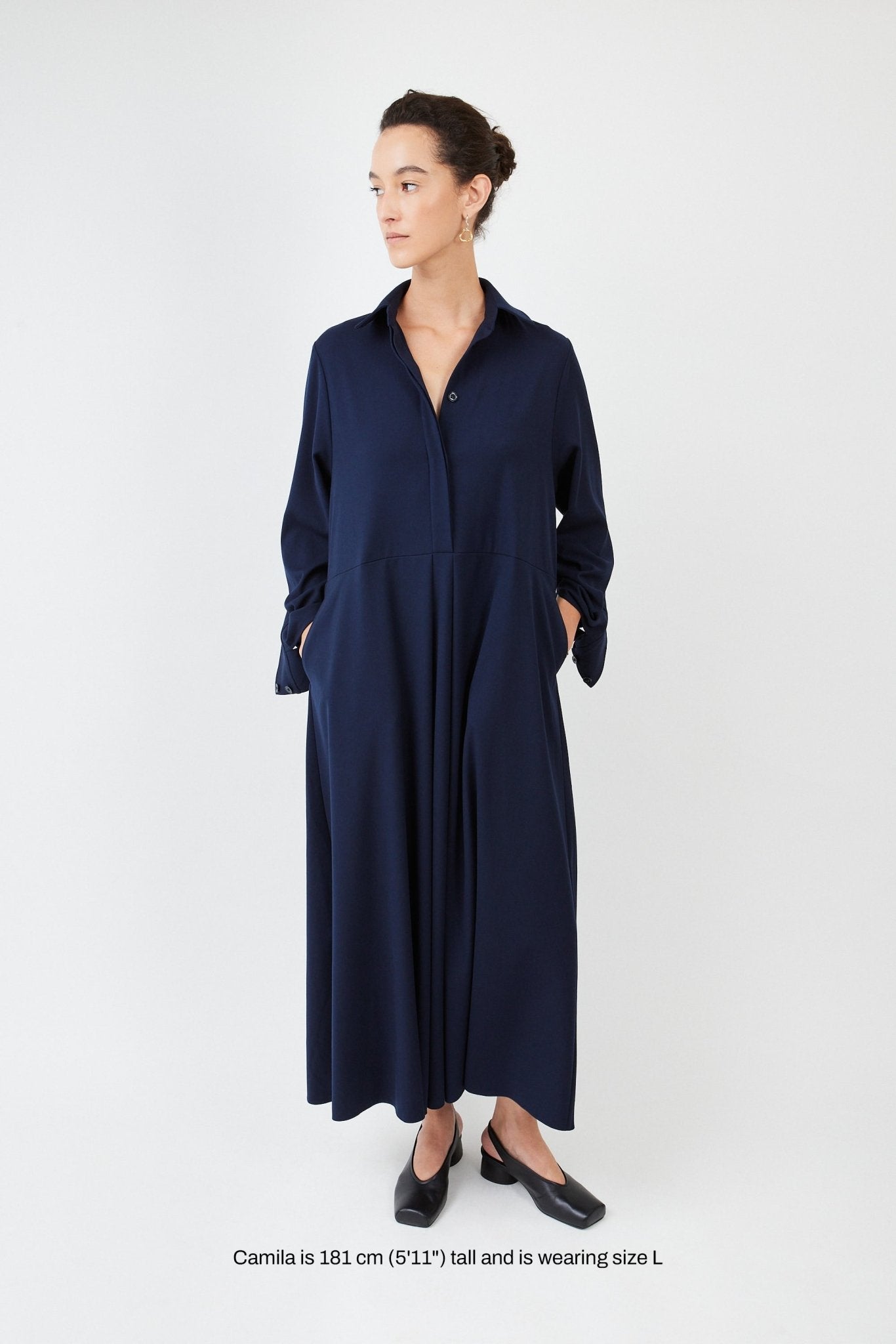 Model wearing midi shirt dress with elegant drape and modern fit| Navy - Maison Marron et amis