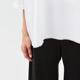 Selvedge hem detail on white poplin T-shirt – structured, sustainable cotton- Maison Marron et amis